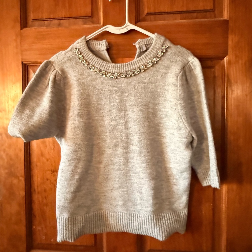 Elegant Gray Sweater with Embellished Neckline